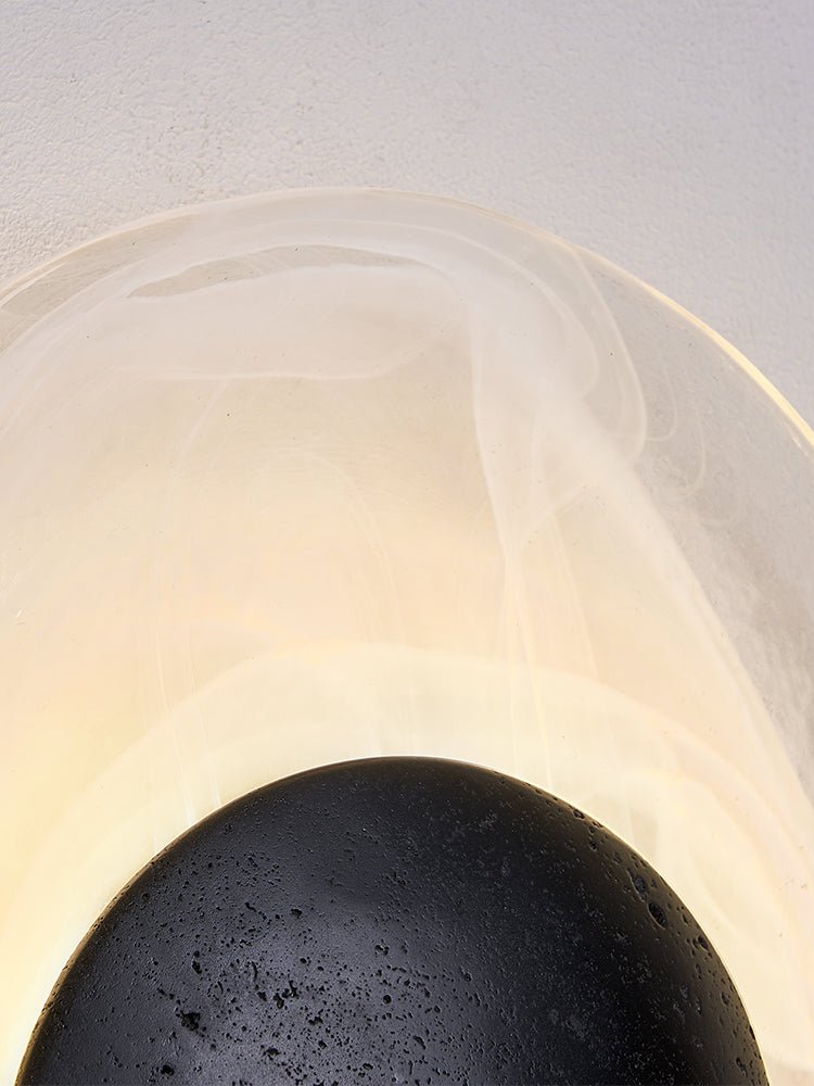 Orla Cosmica Eclipse Black Travertine Shell Wall Lamp