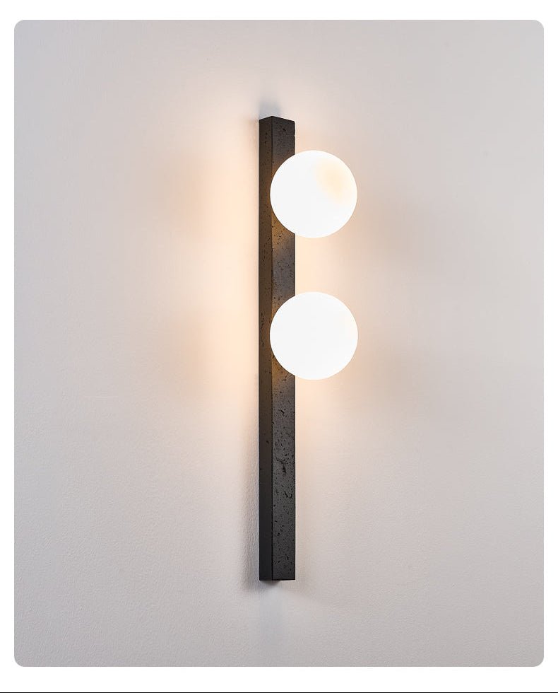 Zoshaira Globe Black Travertine Wall Sconce