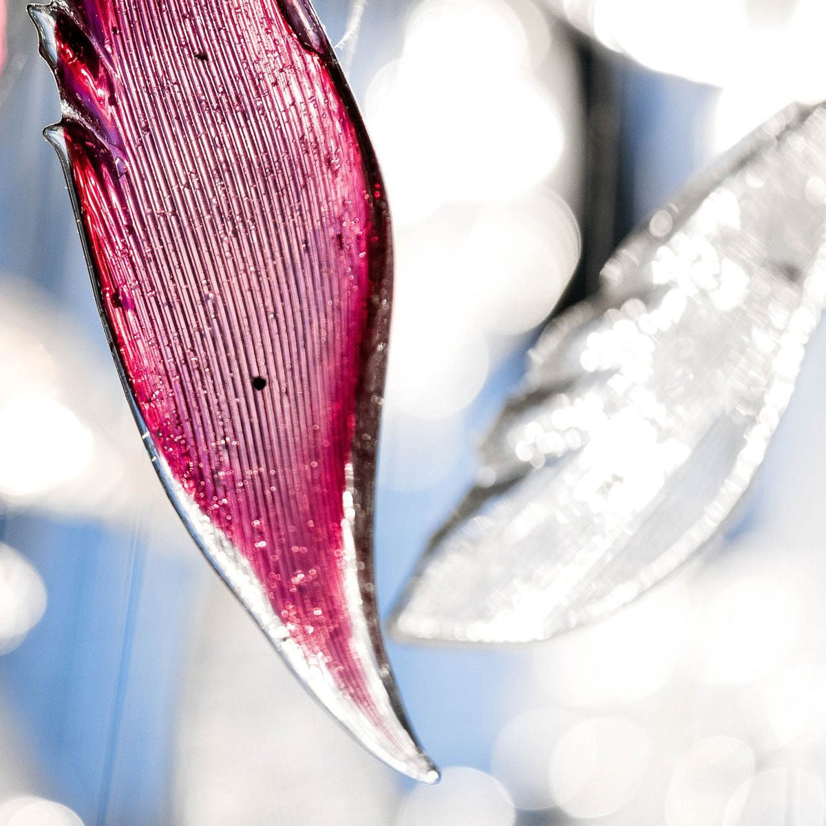 Zathaara Glass Feather Shape Chandelier