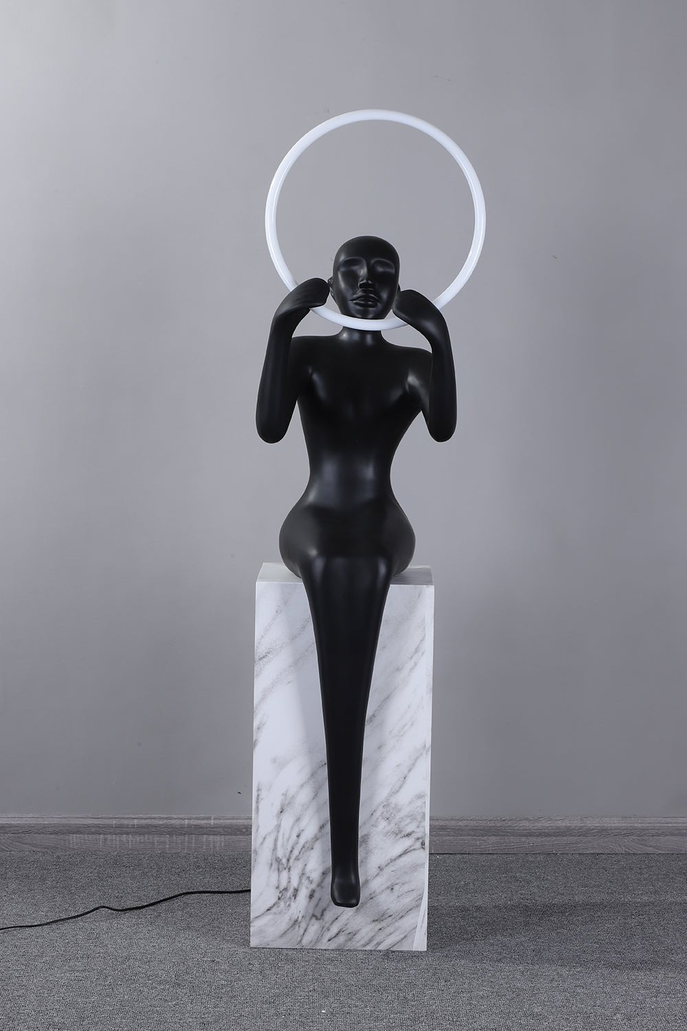 Orelaielle Sculptural Black Floor Lamp