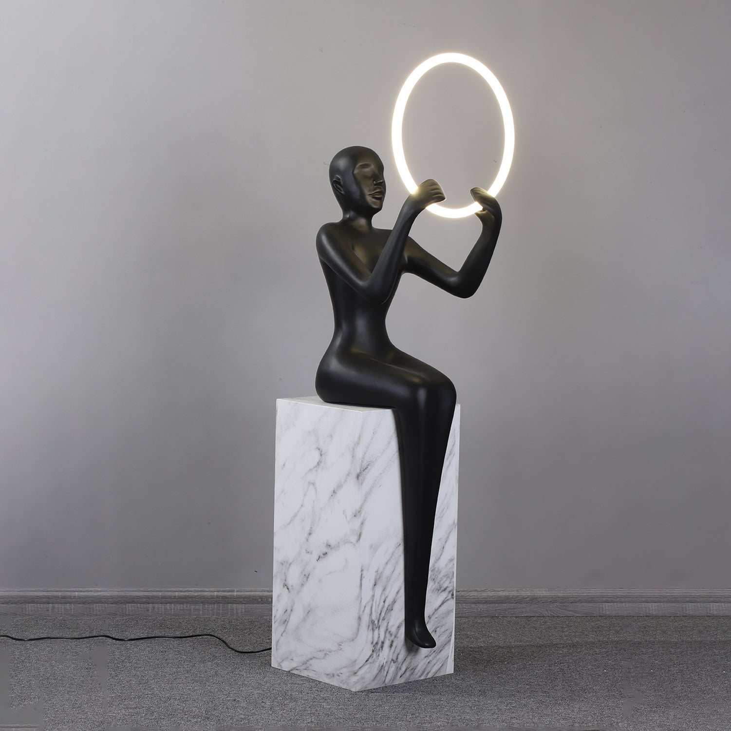 Orelaielle Sculptural Black Floor Lamp