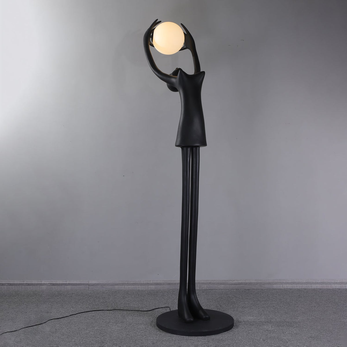 Lynorel Figurative Black Floor Lamp