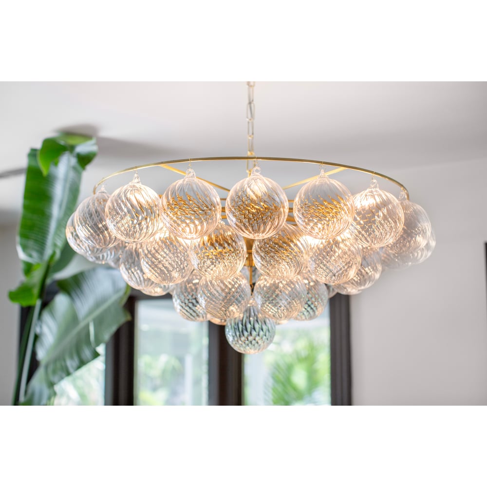 Velineon Chandelier Clear Glass Globe Aged Brass Elegant