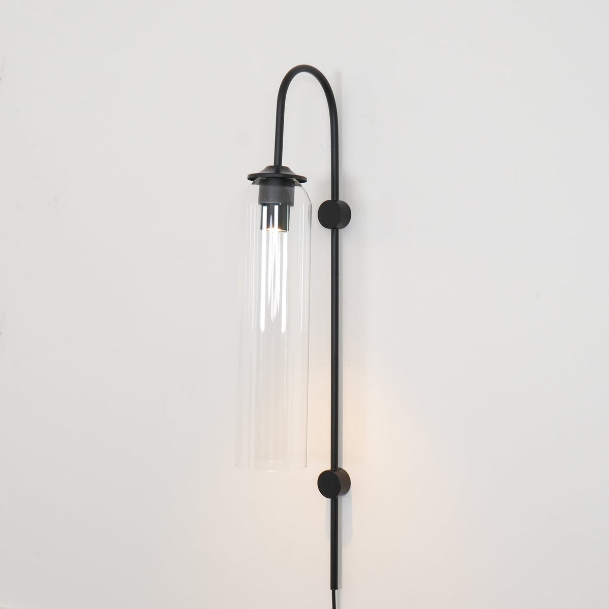 Conrad Modern Glass Plug-In Wall Lamp