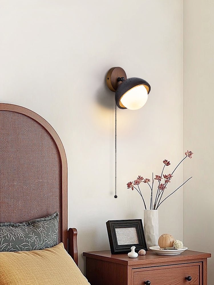 Serenaria Globe Black Travertine Pivot Sconce