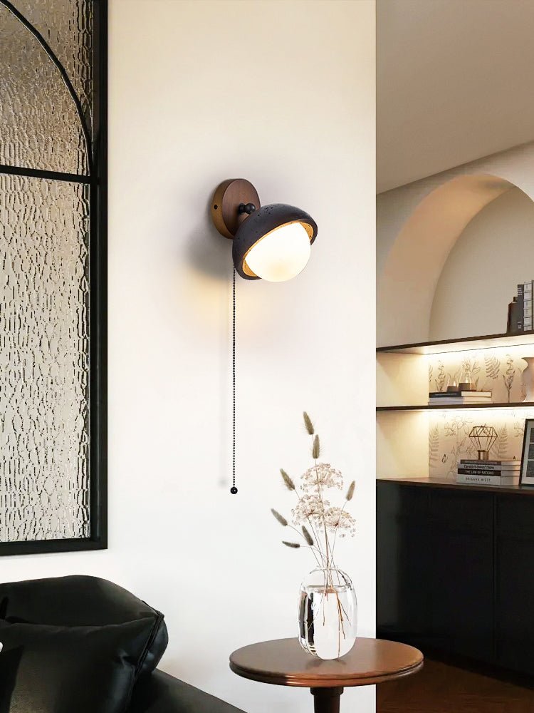 Serenaria Globe Black Travertine Pivot Sconce