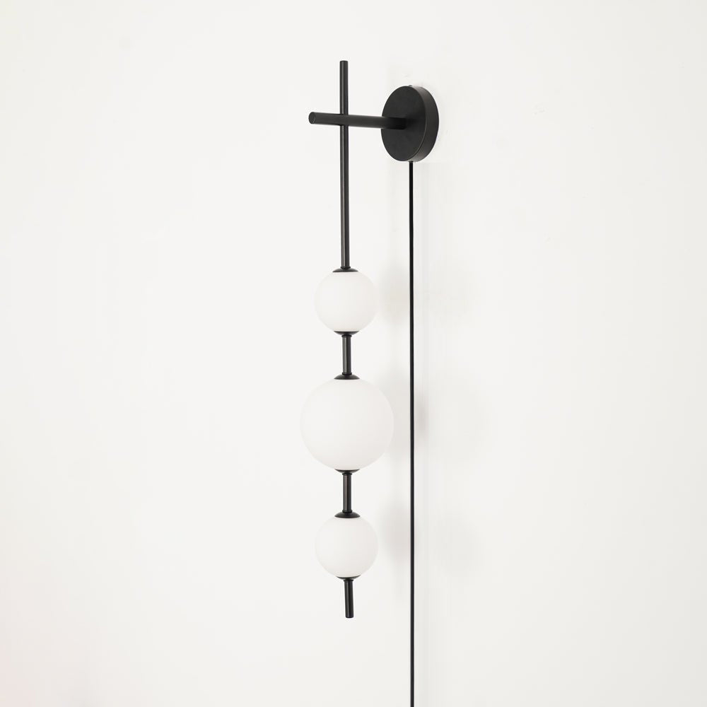 Ilraeia Vertical Globe Plug-in Wall Lamp