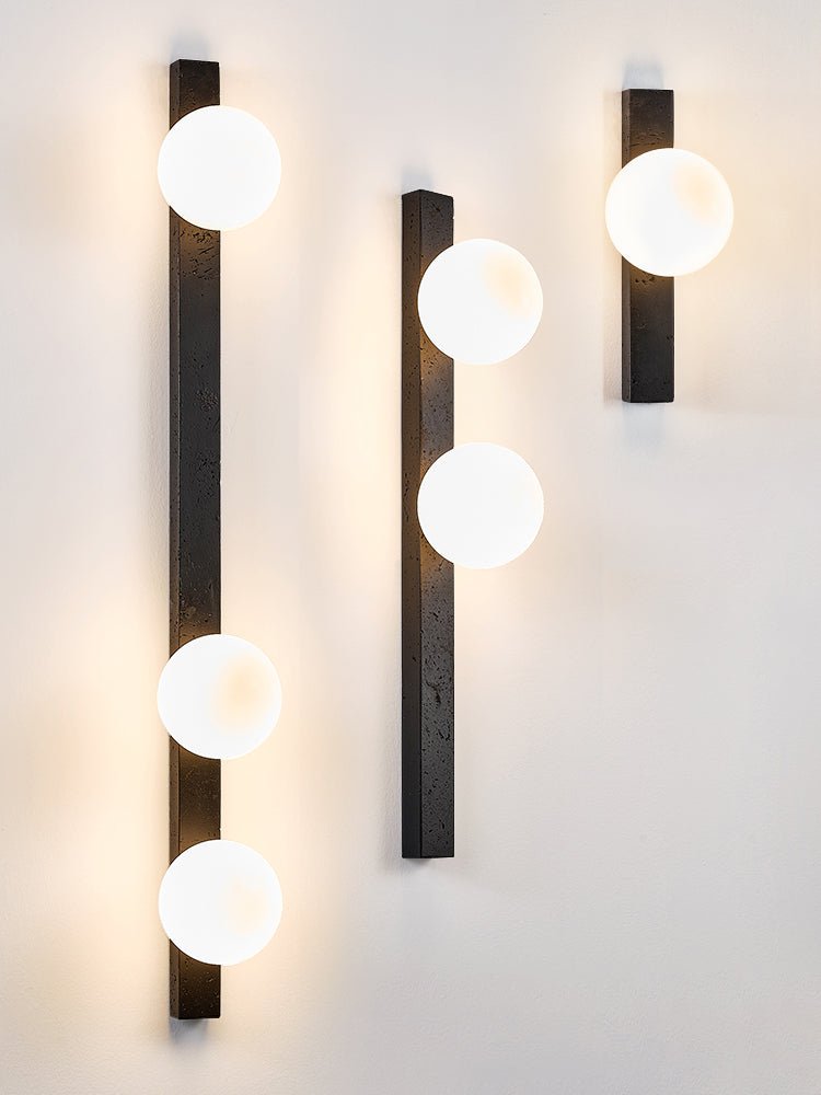 Zoshaira Globe Black Travertine  Wall Sconce