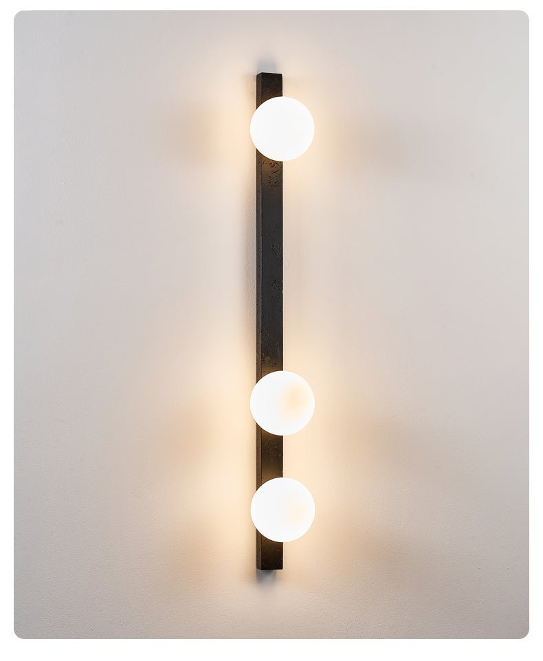 Zoshaira Globe Black Travertine  Wall Sconce