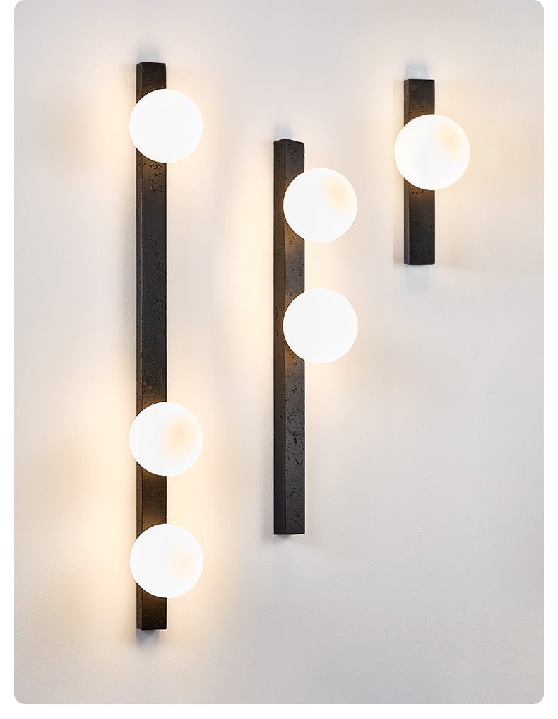 Zoshaira Globe Black Travertine  Wall Sconce