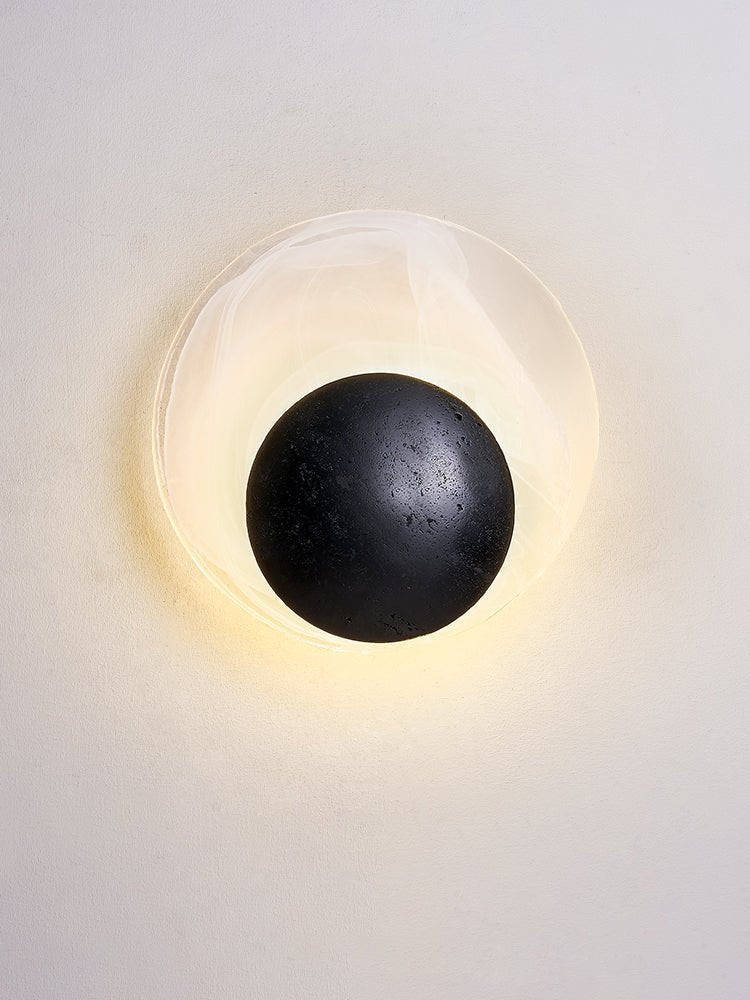 Orla Cosmica Eclipse Black Travertine Shell Wall Lamp