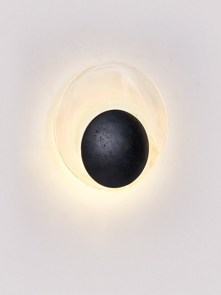 Orla Cosmica Eclipse Black Travertine Shell Wall Lamp