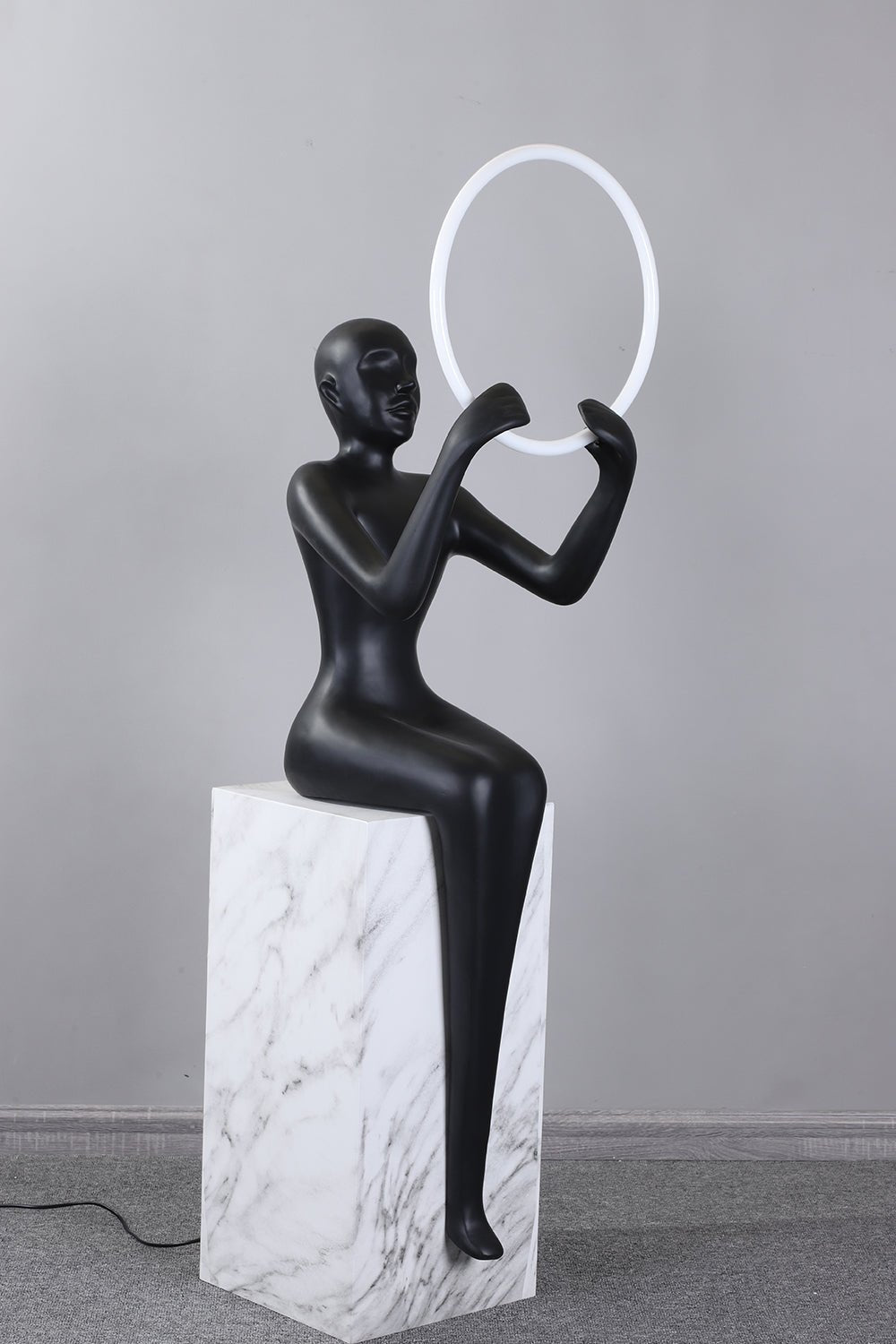 Orelaielle Sculptural Black Floor Lamp