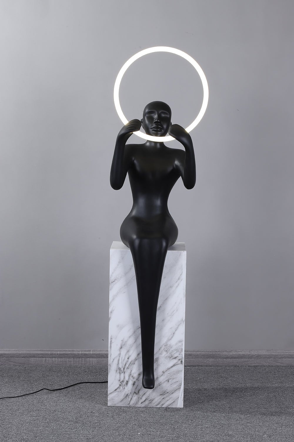 Orelaielle Sculptural Black Floor Lamp