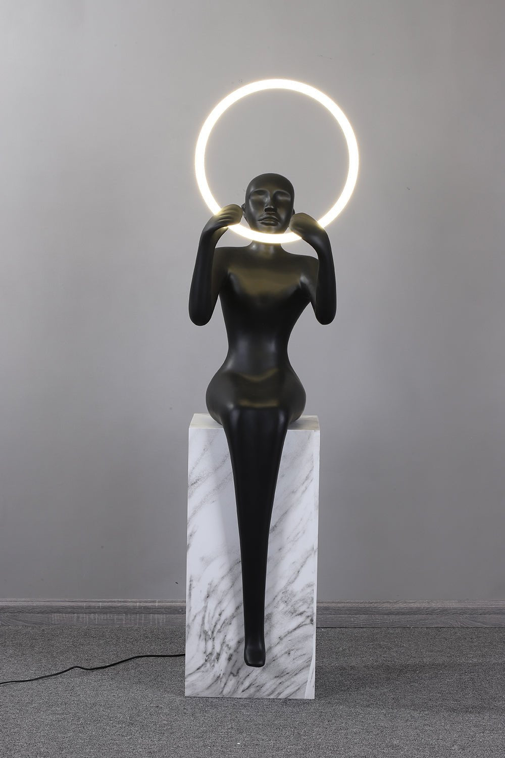 Orelaielle Sculptural Black Floor Lamp