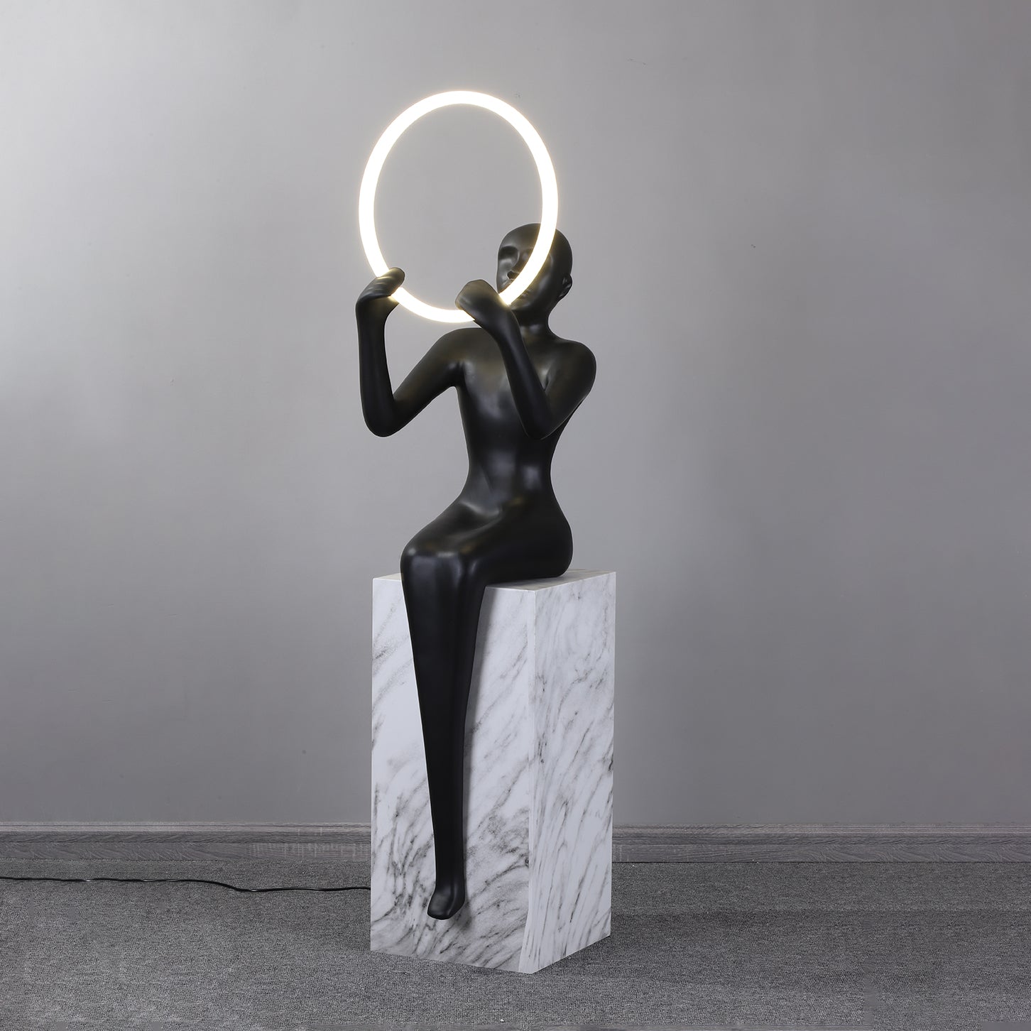Orelaielle Sculptural Black Floor Lamp