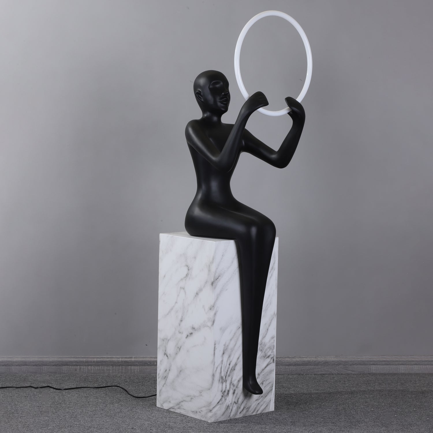 Orelaielle Sculptural Black Floor Lamp