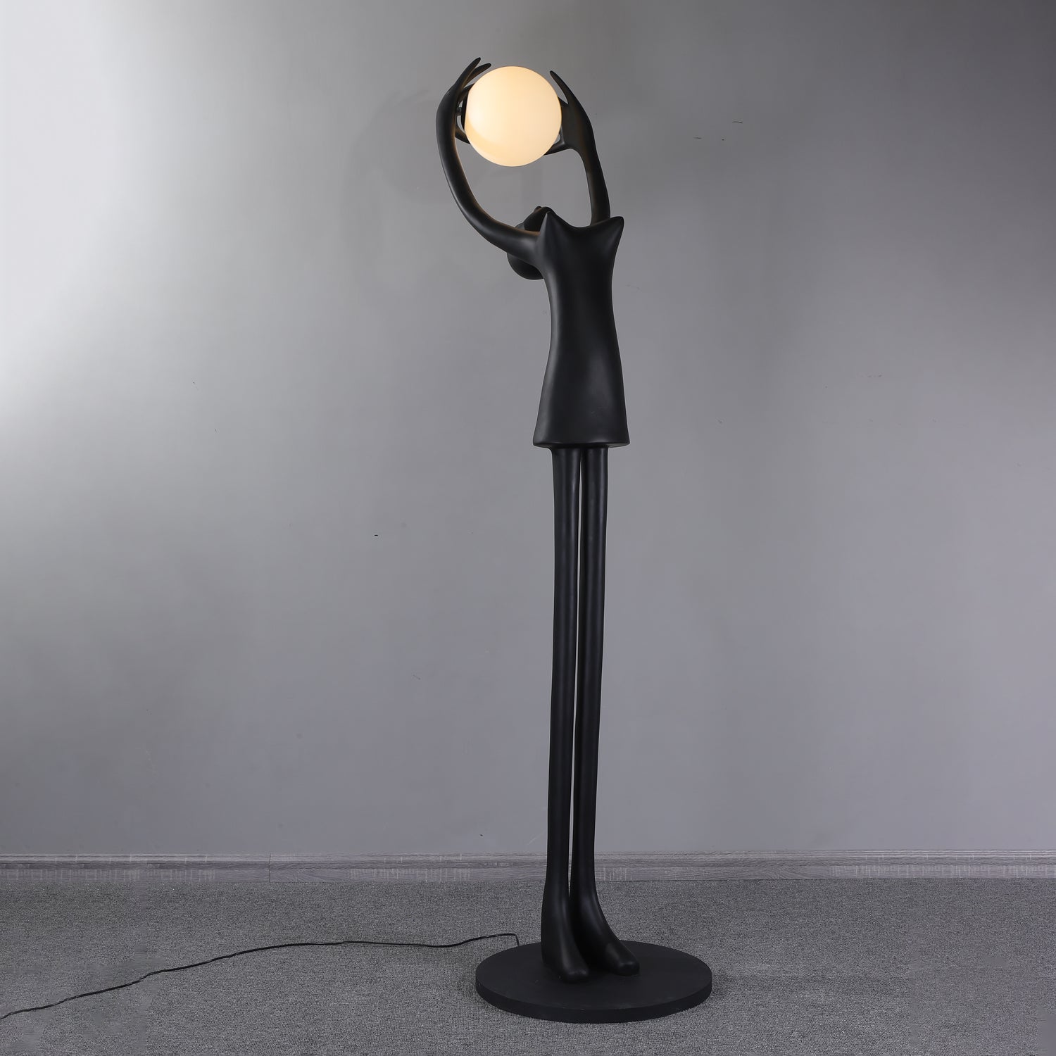 Lynorel Figurative Black Floor Lamp
