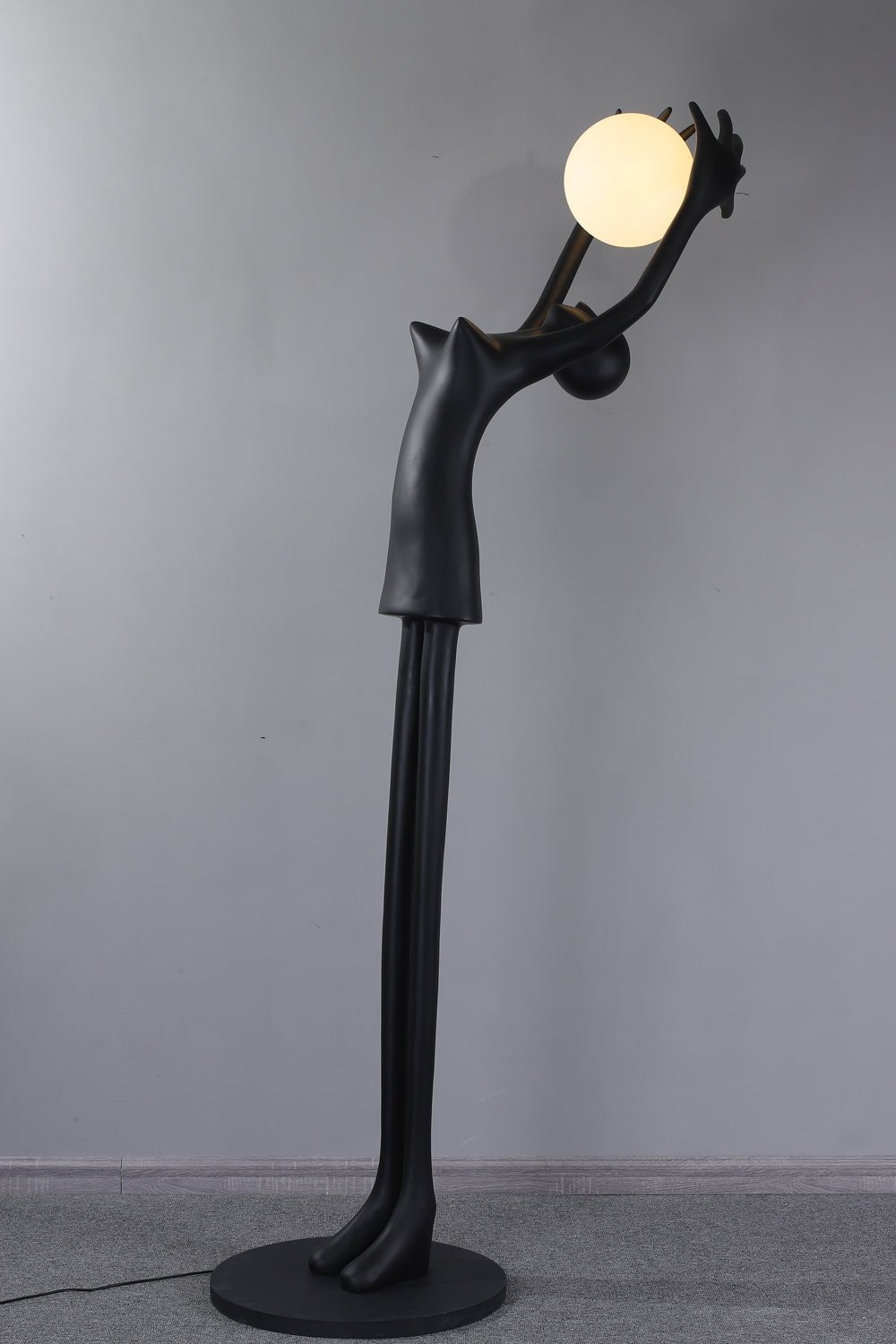 Lynorel Figurative Black Floor Lamp