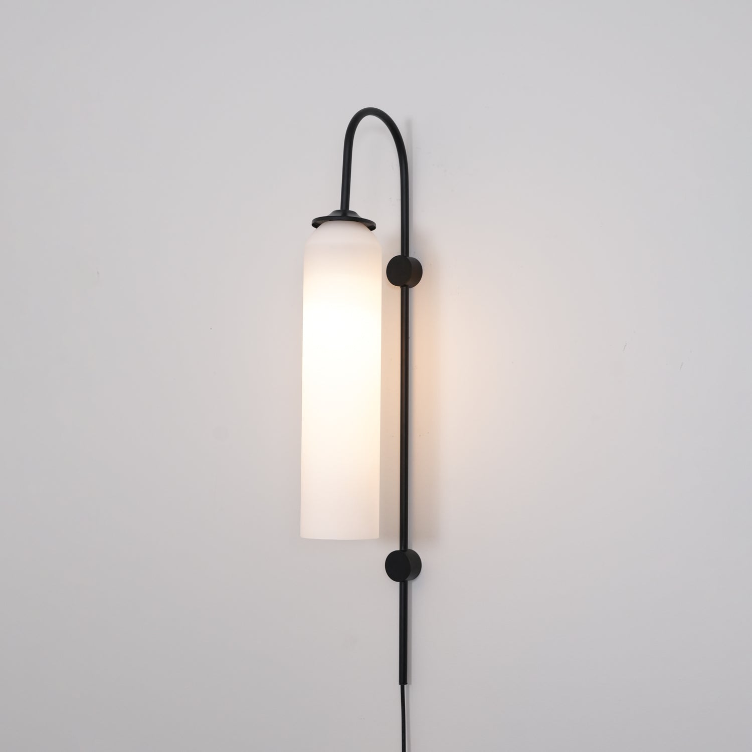 Conrad Modern Glass Plug-In Wall Lamp