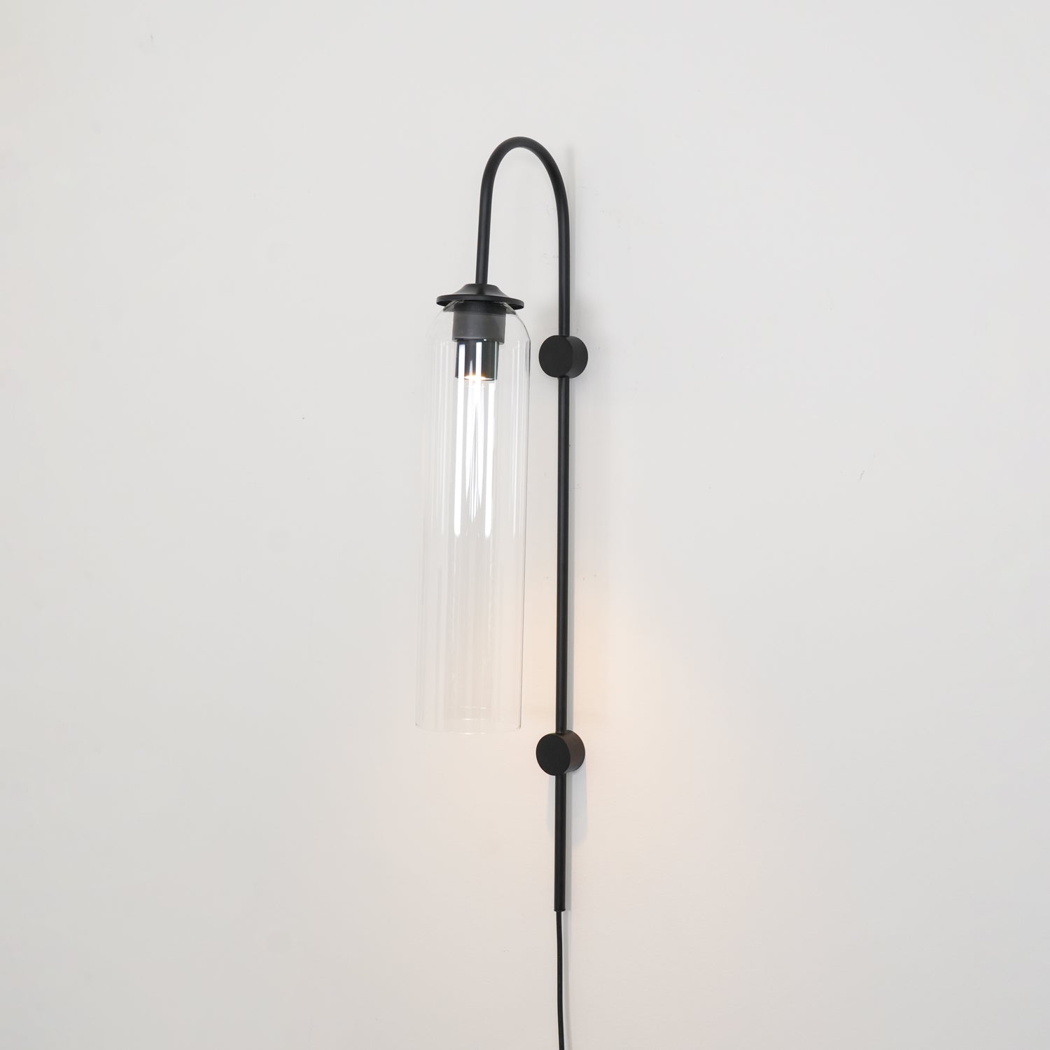 Conrad Modern Glass Plug-In Wall Lamp