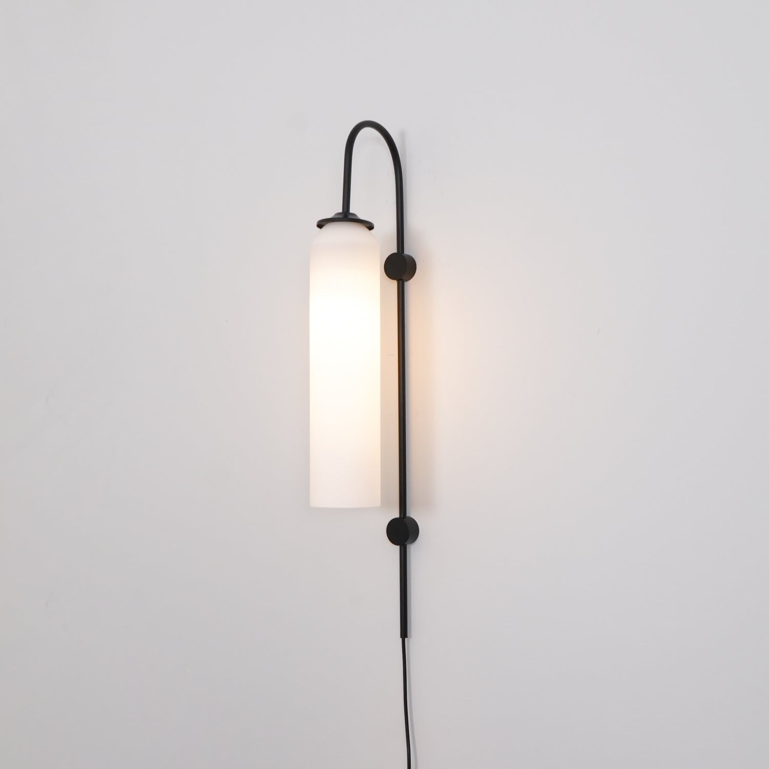 Conrad Modern Glass Plug-In Wall Lamp
