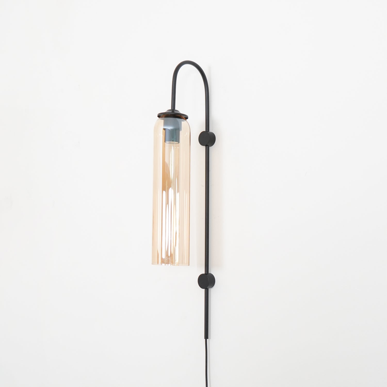 Conrad Modern Glass Plug-In Wall Lamp