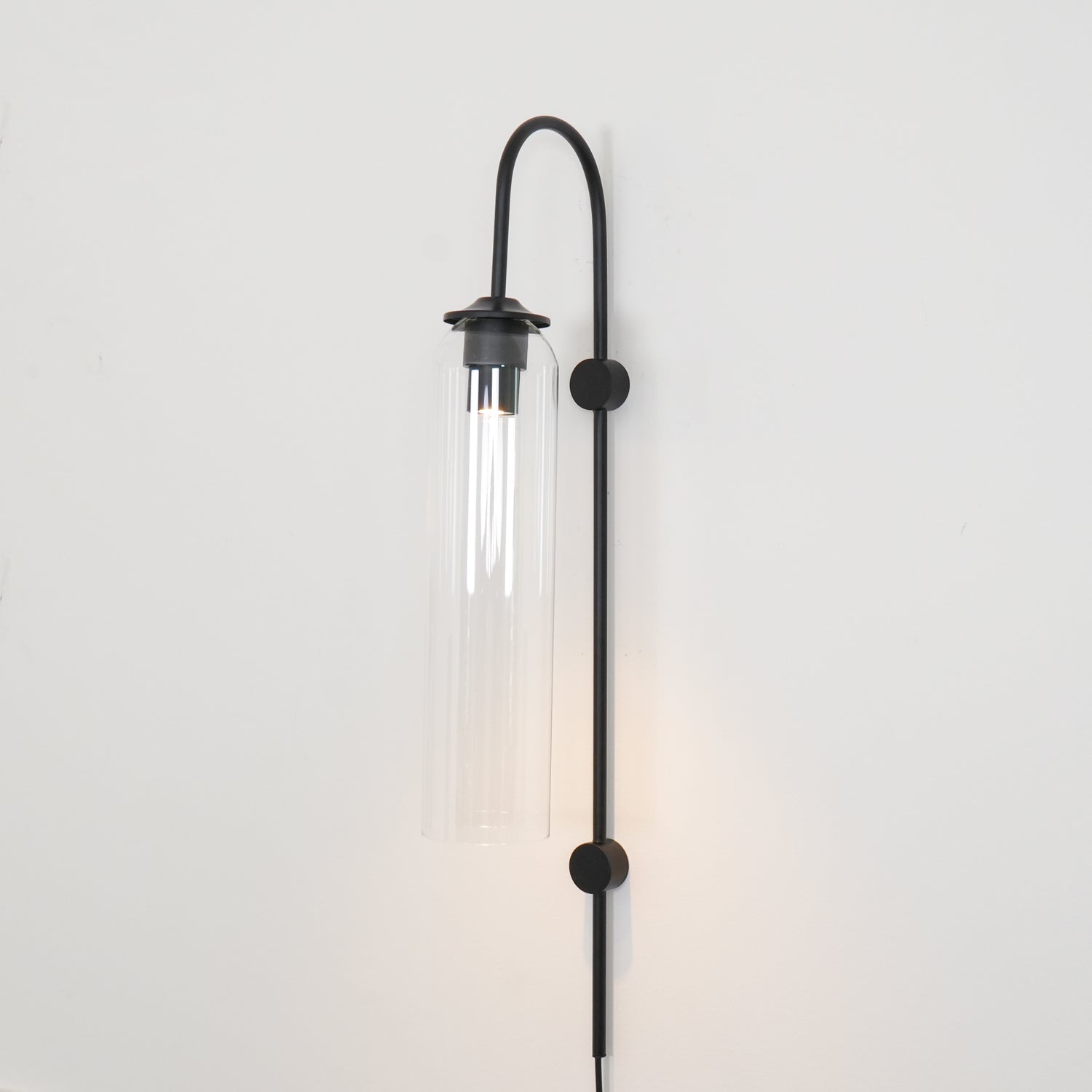 Conrad Modern Glass Plug-In Wall Lamp