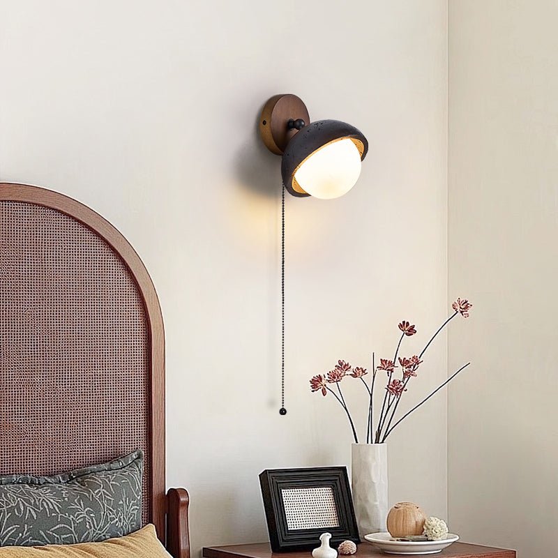Serenaria Globe Black Travertine Pivot Sconce