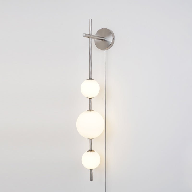 Ilraeia Vertical Globe Plug-in Wall Lamp