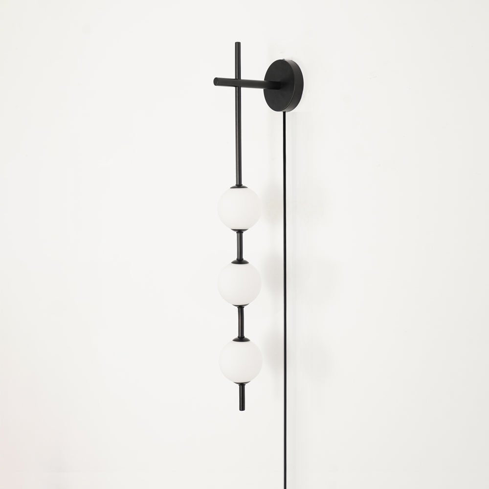 Ilraeia Vertical Globe Plug-in Wall Lamp